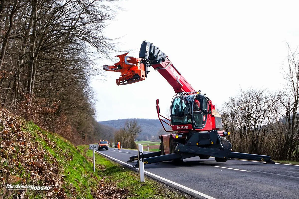 Telehandler with Tree Shear attachment