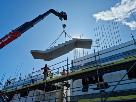 Telehandler lifting precast concrete panels